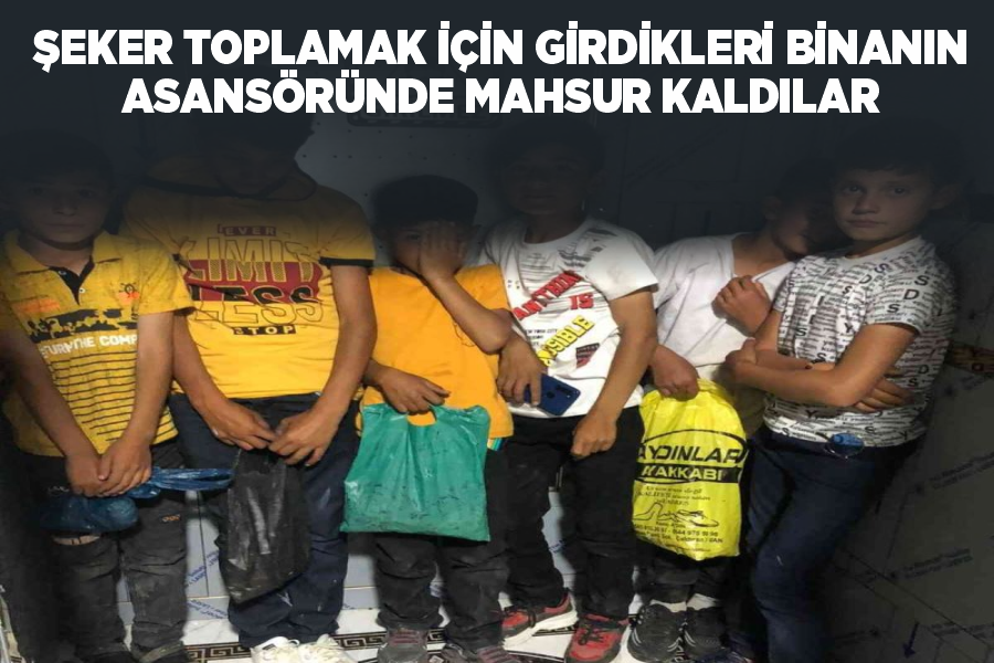 Şeker toplamak için girdikleri binanın asansöründe mahsur kaldılar