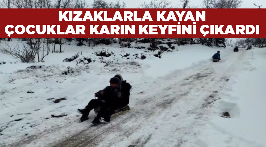 Kızaklarla kayan çocuklar karın keyfini çıkardı