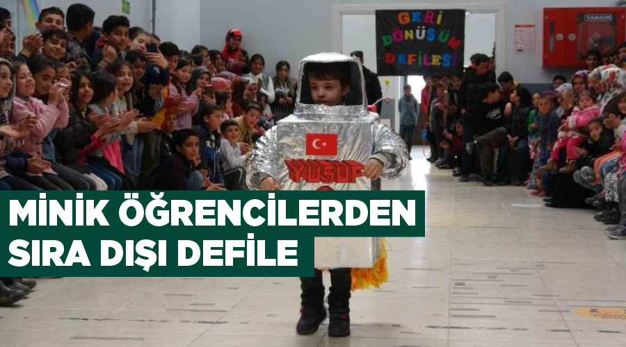 Minik öğrencilerden sıra dışı defile