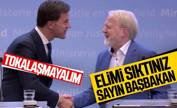 Hollanda Başbakanı, 'tokalaşmayın' deyip el sıkıştı