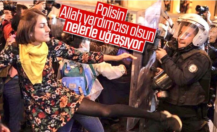 Kadınlar terörist posteri açıp polise saldırdılar